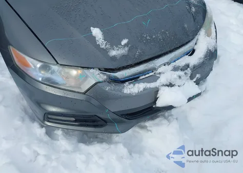 2013 Honda Insight Ex z USA, uszkodzony, nr VIN JHMZE2H78DS002111